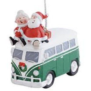 Cape Shore Santa and Mrs Claus on old style van